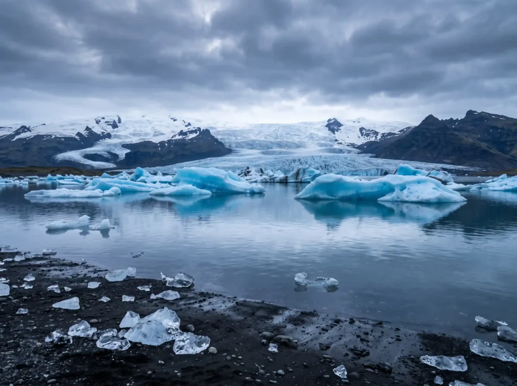 Luminous blue icebergs floating quietly in the chilly waters of Jokulsarlon glacier lagoon Iceland