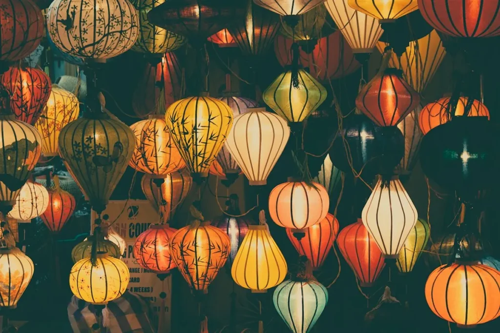 Charming lantern-lit historic streets and riverboats in Hoi An Vietnam
